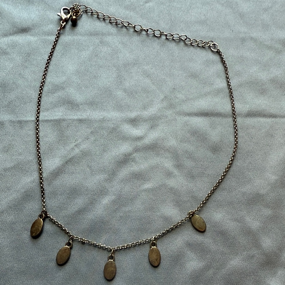 Elegant Gold Necklace with Charms